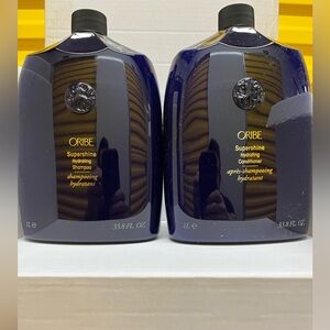 Oribe Supershine Hydrating Shampoo and Conditioner 33.8 oz with pumps.